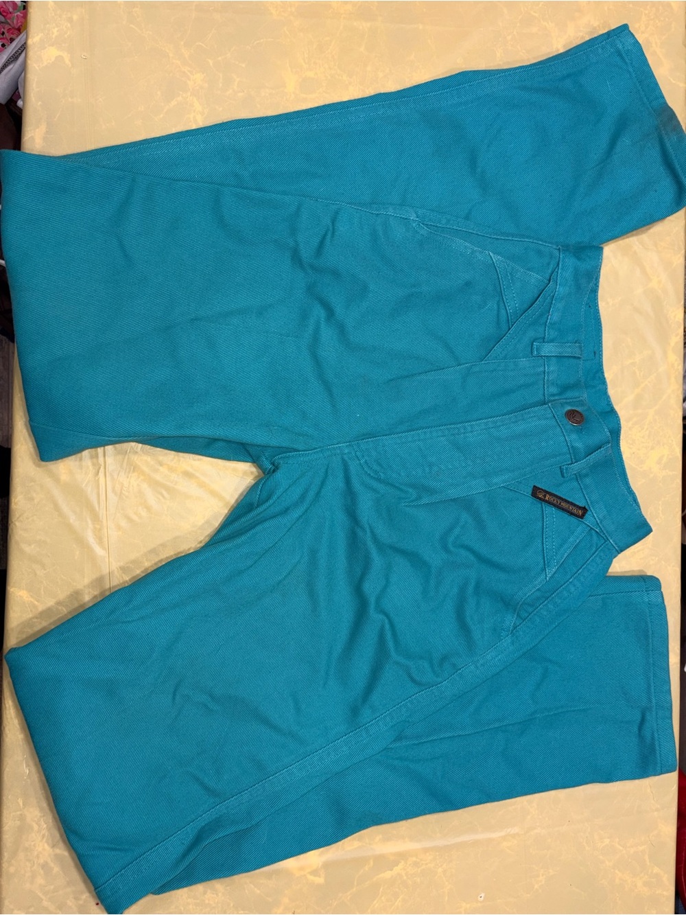 Woman’s Teal Rocky Mountains